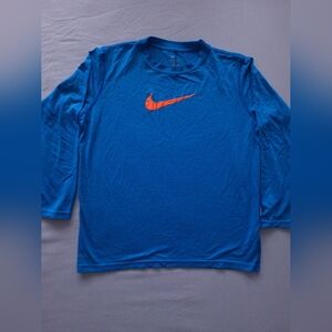 Nike Men’s Blue Dri-FIT T-Shirt with Orange Swoosh